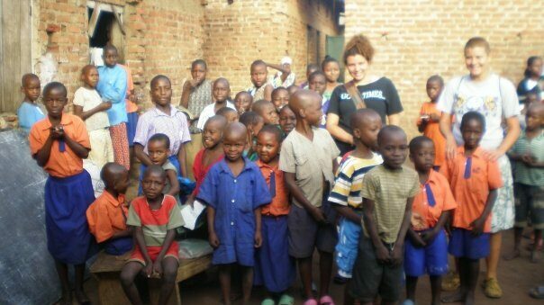 Andrea & Leah volunteering at orphanage in Iganga in 2008